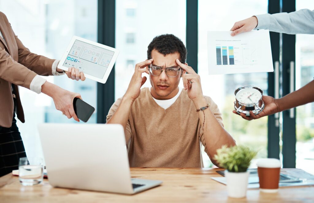 Workplace scene illustrating the commercial impact of a hiring decision